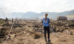 A UN aid worker surveys the damage in the aftermath of devastating floods that hit the Democratic People’s Republic of Korea (DPRK) in September 2016.
