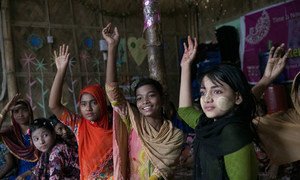 Young girls at a Women-Friendly Space at a Rohingya refugee settlement in Cox's Bazar, Bangladesh. The Spaces offer women and girls a safe haven where they can find sanctuary and support.