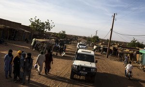 A MINUSMA convoy drives along a street Menaka, north-eastern Mali. The region has witnessed a sharp escalation in violence and insecurity.