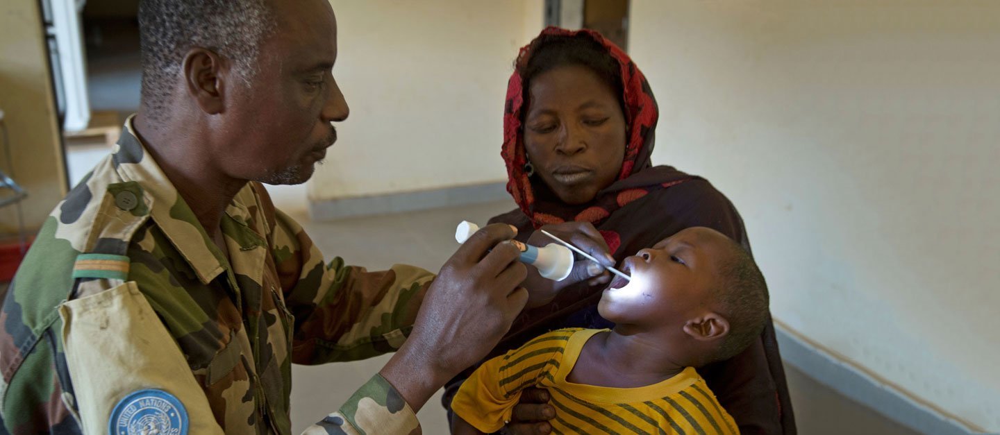 A Malian child receives a free consultation at a medical clinic in Gao run by the Nigerien contingent of the UN mission in the country, known by its French acronym, MINUSMA.