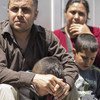 اللاجئ السوري محمود مصطفى عطارعبر نهر إفروس مع عائلته قبل بضعة أشهر ويعيش الان في قاعدة عسكرية سابقة قرب سالونيك في اليونان