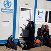 妇女和儿童在伊拉克达玛的医疗门诊接受治疗。