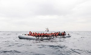 Asylum-seekers and migrants aboard a dinghy in international waters off the coast of Libya in November 2016.