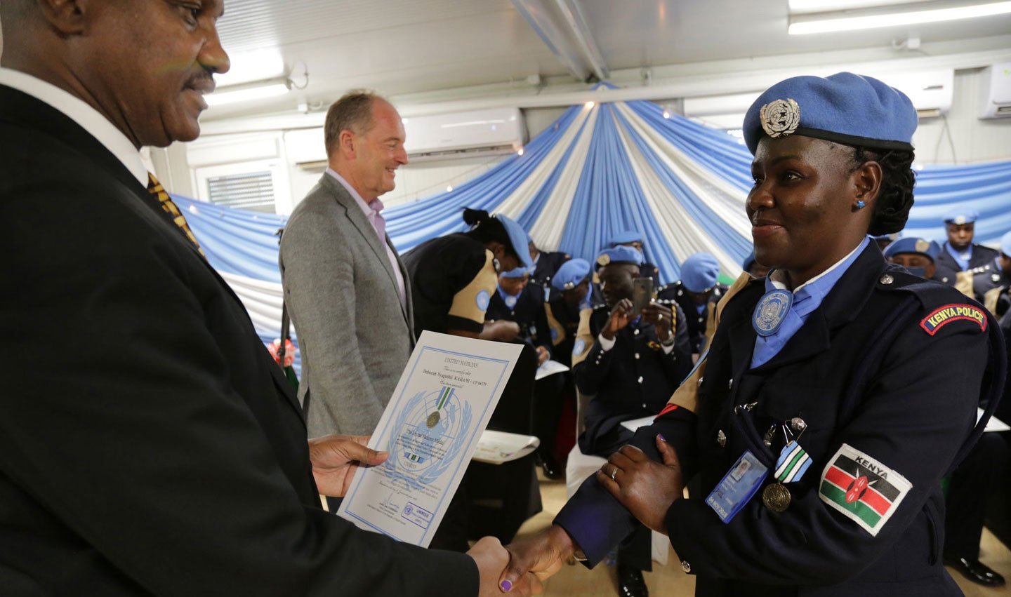 Kenyan police officers with the UN Mission in South Sudan are honoured in June 2018 for their service, including community policing and ensuring the safety of displaced people.