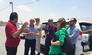 Jamie McGoldrick (2nd left), the UN Humanitarian Coordinator for the occupied Palestinian territory, receives a briefing at the Kerem Shalom crossing point into Gaza on July 17th.