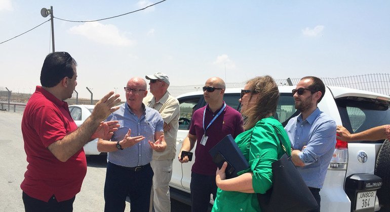 Jamie McGoldrick (2nd left), the UN Humanitarian Coordinator for the occupied Palestinian territory, receives a briefing at the Kerem Shalom crossing point into Gaza on July 17th.