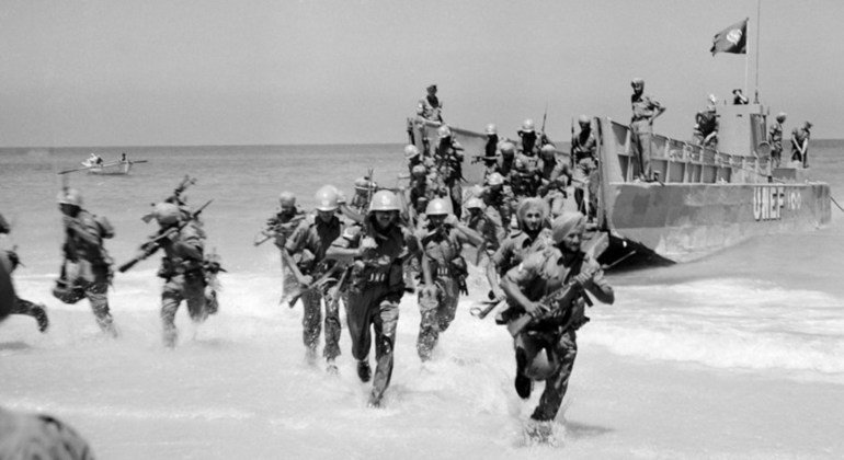 Indian peacekeepers take part in a United Nations Emergency Force (UNEF) exercise to practice evacuation and landing on a beach in Gaza in 1958.