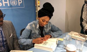 Zamaswazi, granddaughter of Nelson and Winnie Mandela, signs copies of the newly published book, "The Prison Letters of Nelson Mandela", at the UN Bookshop at United Nations Headquarters in New York, 20 July 2018.