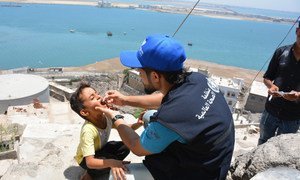 On 7 May 2018 in Aden, Yemen, a boy is vaccinated against cholera.