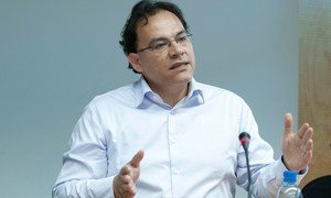 Khaled Mansour addresses the Global United Nations Communications Group meeting at the Headquarters of the World Meteorological Oranization in Geneva (June 2011).