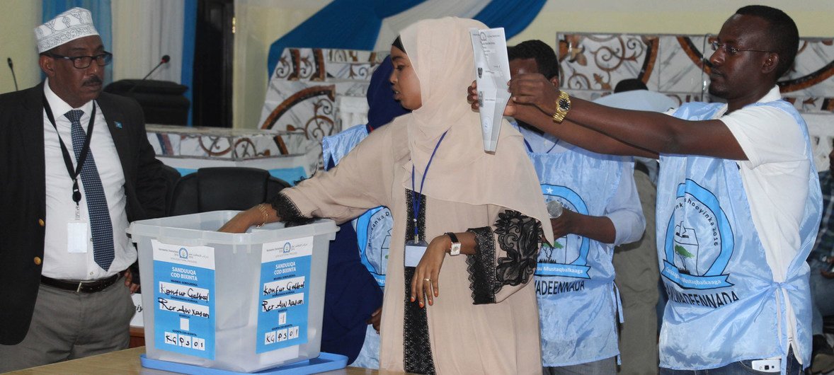 Electoral officials count votes during the electoral process to choose members of the Lower House of the Federal Parliament in Baidoa, Somalia in November 2016.