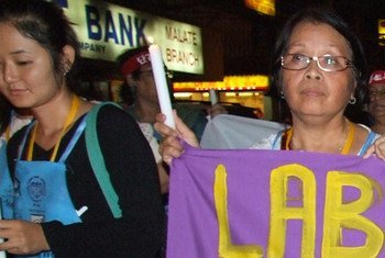 Trabajadoras domésticas participan en una manifestación para mejorar los derechos laborales.