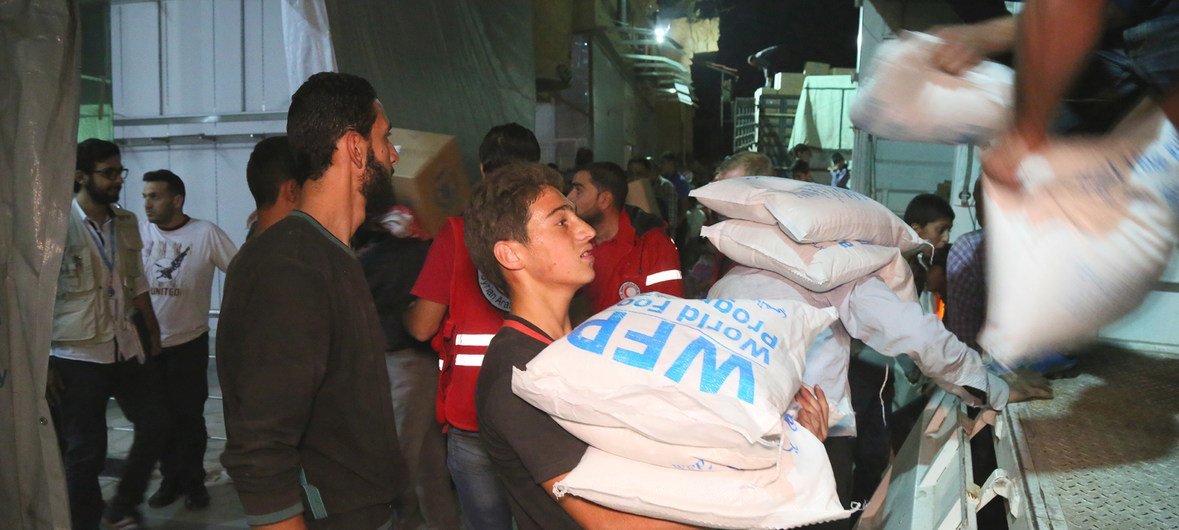 In this file photo, WFP delivers emergency aid to locations in rural Idlib. Amid fears of a Government offensive there, the UN is warning of a possible humanitarian catastrophe.