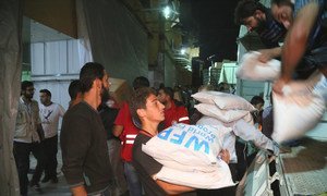 In this file photo, WFP delivers emergency aid to locations in rural Idlib. Amid fears of a Government offensive there, the UN is warning of a possible humanitarian catastrophe.