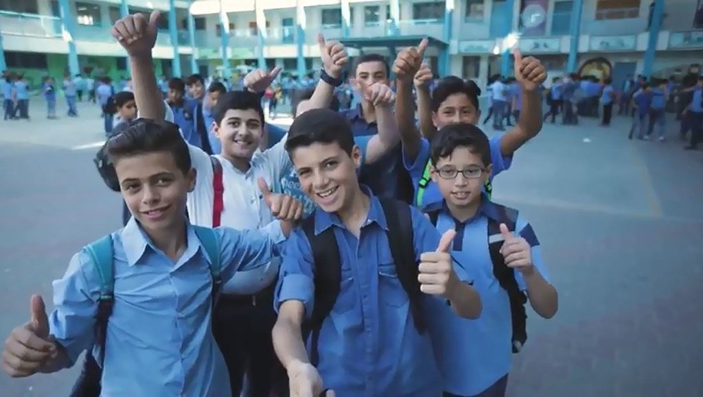 Kareem Abu Kwaik, chef du parlement des élèves des écoles de l'UNRWA, et ses amis retournent à l'école à la fin du mois d’août 2018.