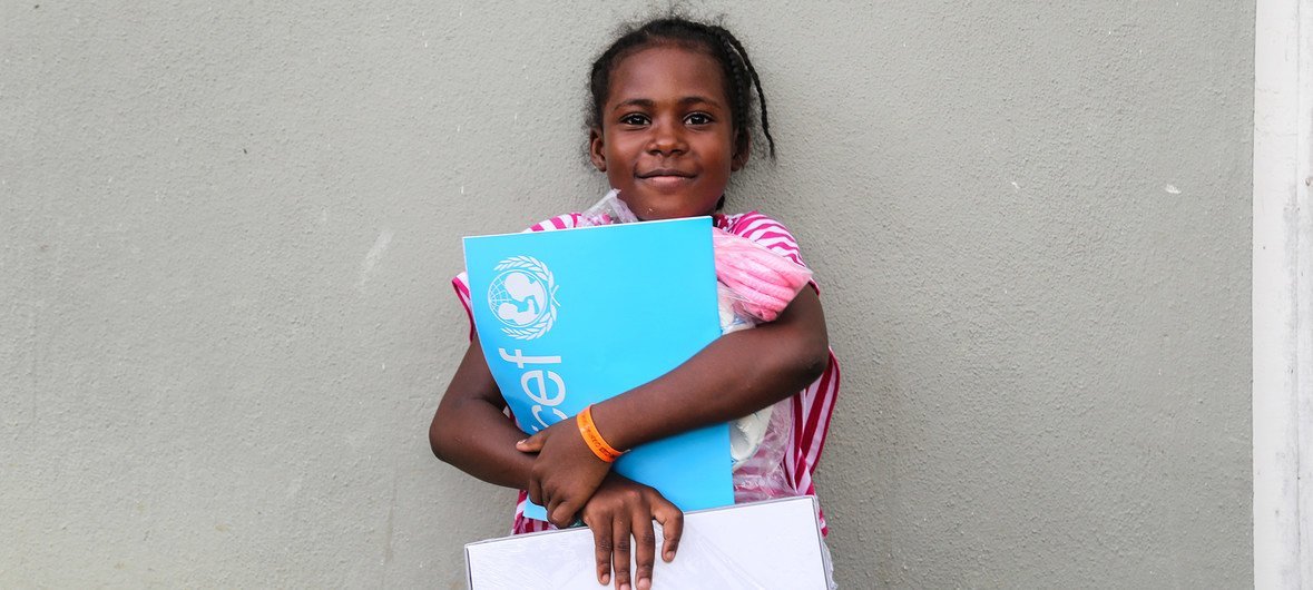 Children who were evacuated from Barbuda during the 2017 hurricane season in the Caribbean received educational and recreational supplies from the UN Children's Fund.