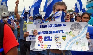 “They were students, not criminals” reads a demonstrator's placard  in Managua, Nicaragua. (file July 2018)