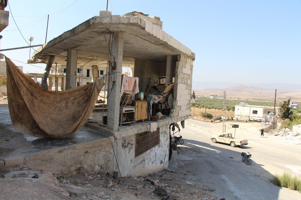 The humanitarian situation across Syria remains dire and millions across the war-torn country remain dependent on international assistance. Pictured here, a damaged building in Idlib, which is being used as a makeshift shelter.