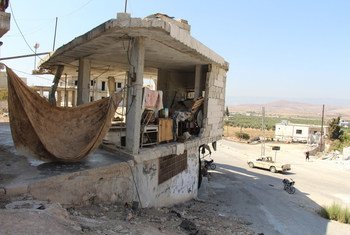 The humanitarian situation across Syria remains dire and millions across the war-torn country remain dependent on international assistance. Pictured here, a damaged building in Idlib, which is being used as a makeshift shelter.