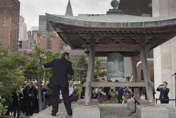 Secretary-General António Guterres rings the Peace Bell at the annual ceremony held at UN Headquarters in observance of the International Day of Peace.