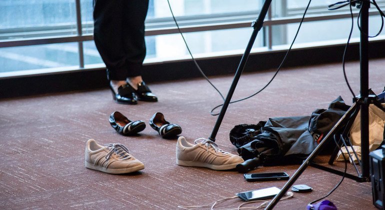 Journalists wait close to the media stake-out located outside the UN Security-Council.