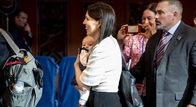 Jacinda Ardern, Prime Minister of New Zealand, carries her daughter Neve between meetings on the third day of the General Assembly's seventy-third general debate. 27 September 2018.