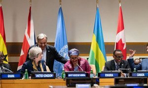 Secretary-General António Guterres (standing) shares a laugh with participants of an event on the margins of the general debate of the seventy-third General Assembly. Also pictured (seated left to right): Ghanaian President Nana Addo Dankwa Akufo-Addo, UK Prime Minister Theresa May, Deputy Secretary-General Amina Mohammed, Rwandan President Paul Kagame and Canadian Prime Minister Justin Trudeau.