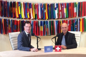 Explorer and UNEP Goodwill Ambassador Bertrand Piccard (right) speaking to UN News's Conor Lennon at UN Headquarters in New York on 26 September 2018.
