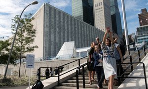 A group of participants of the 2018 high-level week pose for a selfie in the rose garden of UN Headquarters on the third day of the General Assembly's seventy-third general debate.
