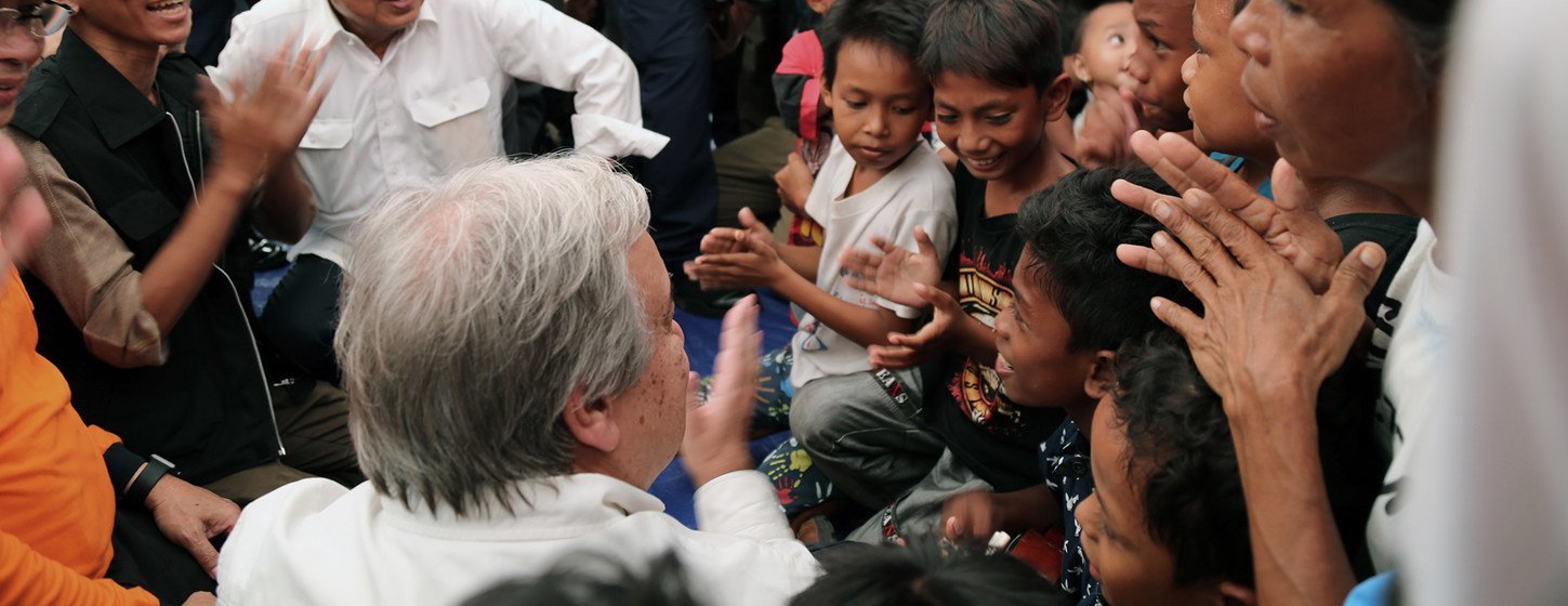 Secretary General António Guterres singing along with children who have been affected by the recent earthquake and tsunami in Palu, in the Indonesian island of Sulawesi.  12 October 2018.