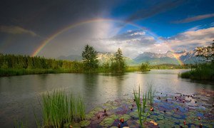 A rainbow over lake Barmsee in Mittenwald, Germany. 