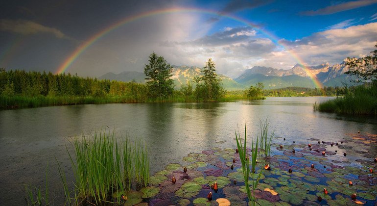A rainbow over lake Barmsee in Mittenwald, Germany. 