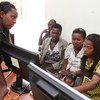 Des jeunes participent à une formation en informatique à Kigali, au Rwanda.