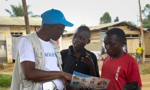 On 12 September 2018 in Beni, a UNICEF staff member discusses the best way to protect yourself against Ebola in a conversation with young people living in Beni, Democratic Republic of Congo, after a recent Ebola outbreak.