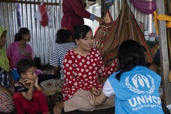 A UNHCR staff member comforts a survivor in Indonesia, who cries as she recounts her traumatic experience during the earthquake and liquefaction, in Palu, on the Indonesian island of Sulawesi.  21 October 2018.