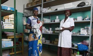 Baby Kadia was born with an infection that is often deadly to newborns. Without the antibiotics administered to her right after birth, she might have died. Seen here are 4-day-old Kadia, her mother Mariam and nurse Aissata at the infirmary of the Reference Health Centre in Bougouni, Mali.  March 2018