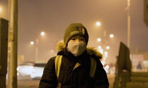 A boy waiting for his school bus in the Songinokhairkhan district of Ulaanbaatar, Mongolia, where air pollution levels are dangerously high.