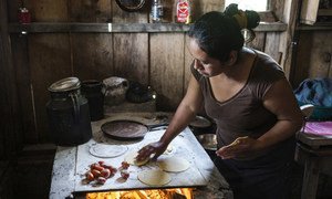 20 July 2017, San Lorenzo, Chiapas, Mexico - Emilia Felipe Jose making tortillas in her home in the village of San Lorenzo. The villlage is populated by Guatemalans who fled their country some years ago.