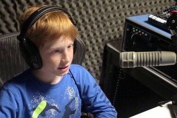 11-year-old Benjamin Gorisek-Gazze, one of the children who 'took over' at UN Headquarters on World Children's Day, records an audio piece for UN News.