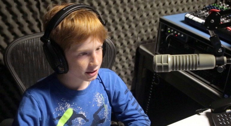 11-year-old Benjamin Gorisek-Gazze, one of the children who 'took over' at UN Headquarters on World Children's Day, records an audio piece for UN News.