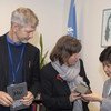 The High Representative for Disarmament Affairs receives a symbolic gift to the UN from IM Swedish Development Partner. The wrist watch is made of metal stemming from seized illegal fire-arms in El Salvador.