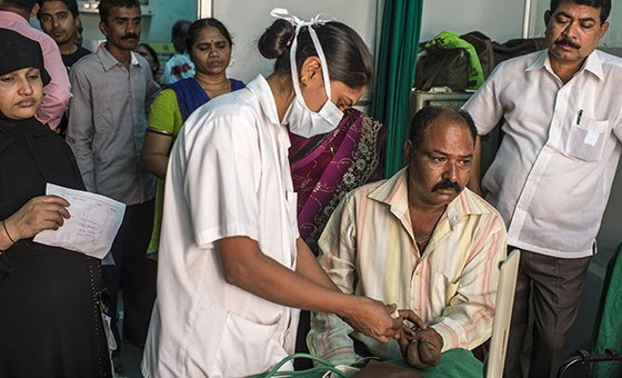 Over the past four decades, diabetes prevalence has risen faster in low- and middle-income countries. In this image, a nurse from Thane Civil Hospital in India checks the level of sugar in the blood of diabetic patients.