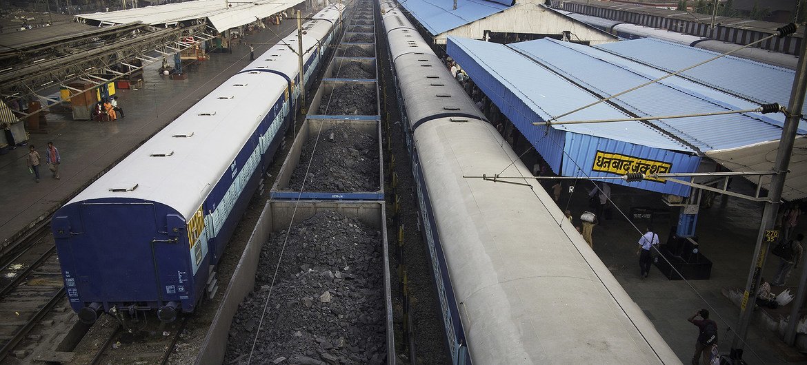 Passenger trains wait for people to board at the Dhanbad Junction railway station in Jharkhand, northern India. One of the busiest in the region, millions of people pass through this station every year.