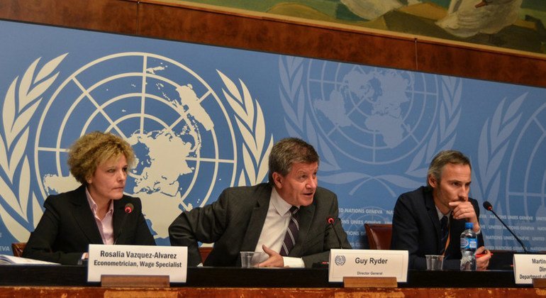 ILO Director-General Guy Ryder (center) speaks at press conference in Geneva.