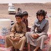 Displaced Yemeni boys sit on mattresses distributed as part of UNHCR's emergency relief effort in Sirwah,Yemen. More than two million Yemenis have been uprooted by the civil war which began in March 2015.