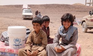 Displaced Yemeni boys sit on mattresses distributed as part of UNHCR's emergency relief effort in Sirwah,Yemen. More than two million Yemenis have been uprooted by the civil war which began in March 2015.