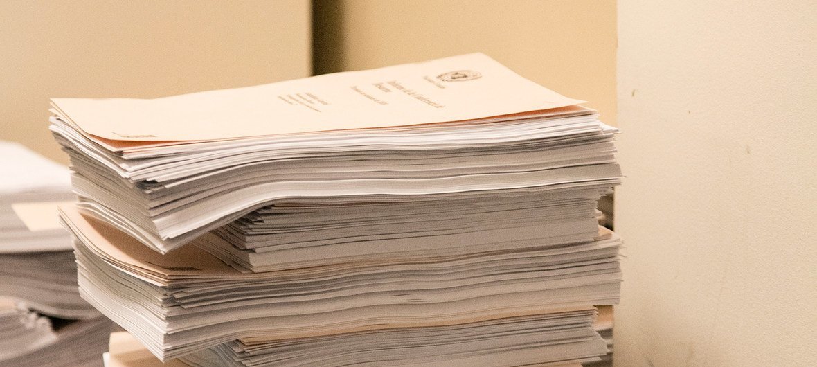A stack of documents during a meeting of the Fourth Committee in 2018.
