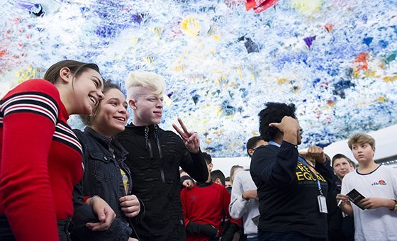 Rapper and activist RobenX (center), with audience members at the event organized by OHCHR on the occassion of the Human Rights Day 2018, observed on December 10 each year, Palais des Nations, Geneva. 13 December 2018.