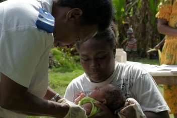 Registered nurse, Miriam Nampil, 55 years, vaccinates the first baby with a commercial drone delivered vaccine. Baby Joy Nowai, one month old, receives vaccines BCG to prevent tuberculosis and Hepatitis B.