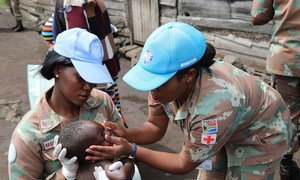 File photo: peacekeepers serving with the United Nations Organization Stabilization Mission in the Democratic Republic of the Congo (MONUSCO) partner with local organizations to provide medical and nutritional care to orphaned and otherwise vulnerable children in North Kivu province.